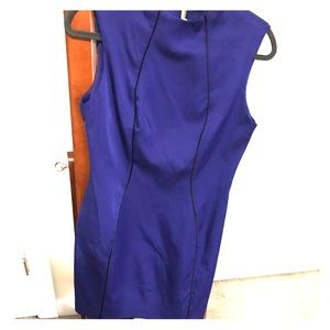 Blue mini dress with exposed zipper in the back.